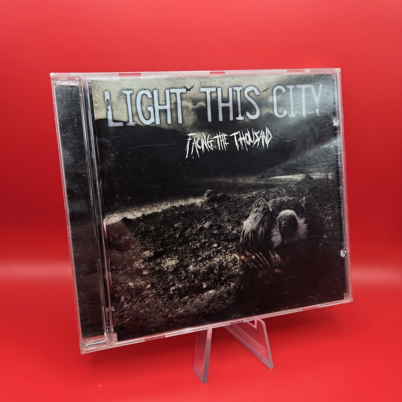 LIGHT THIS CITY FACING THE THOUSAND CD Death Metal